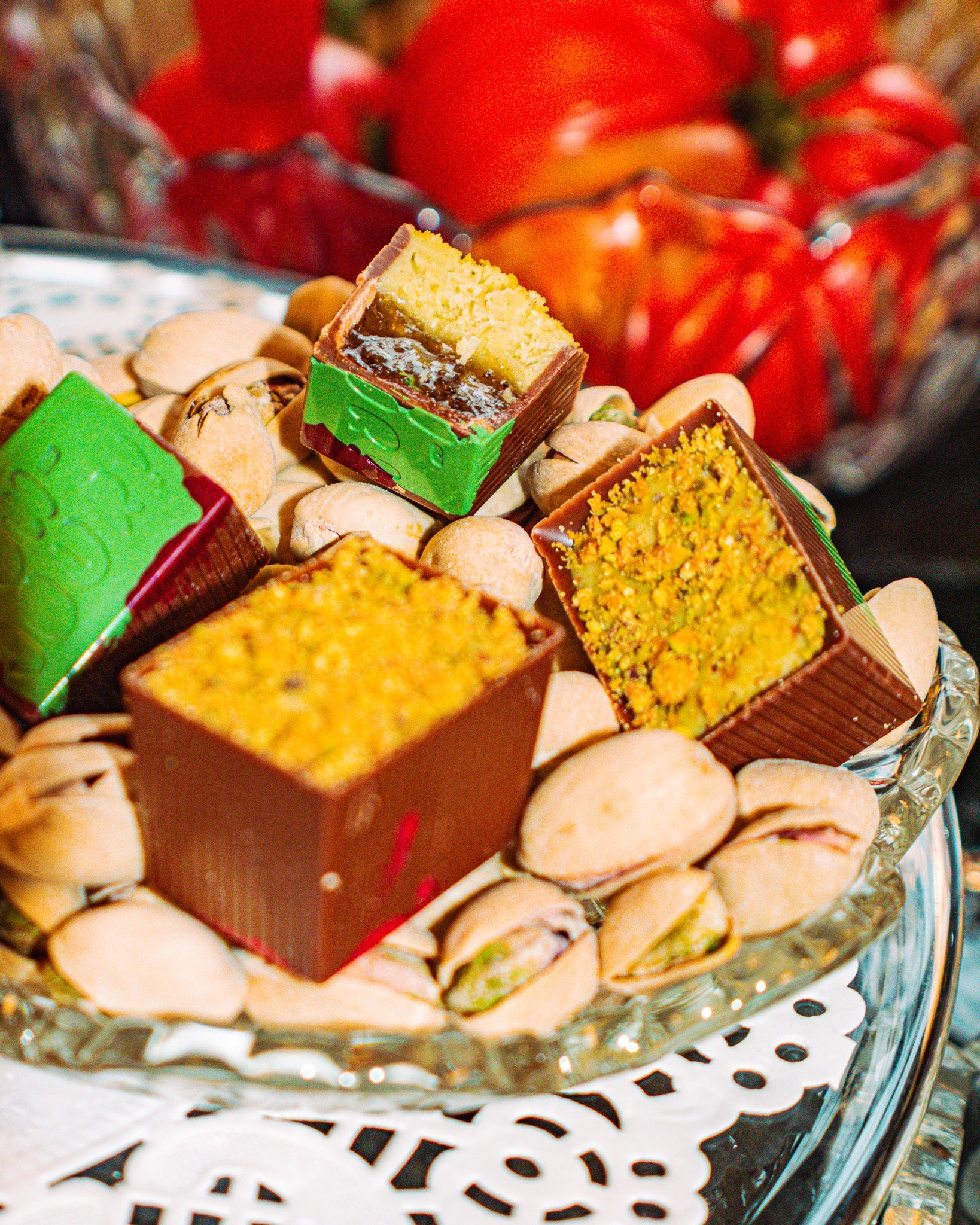 Three Bons in a bowl of pistachios