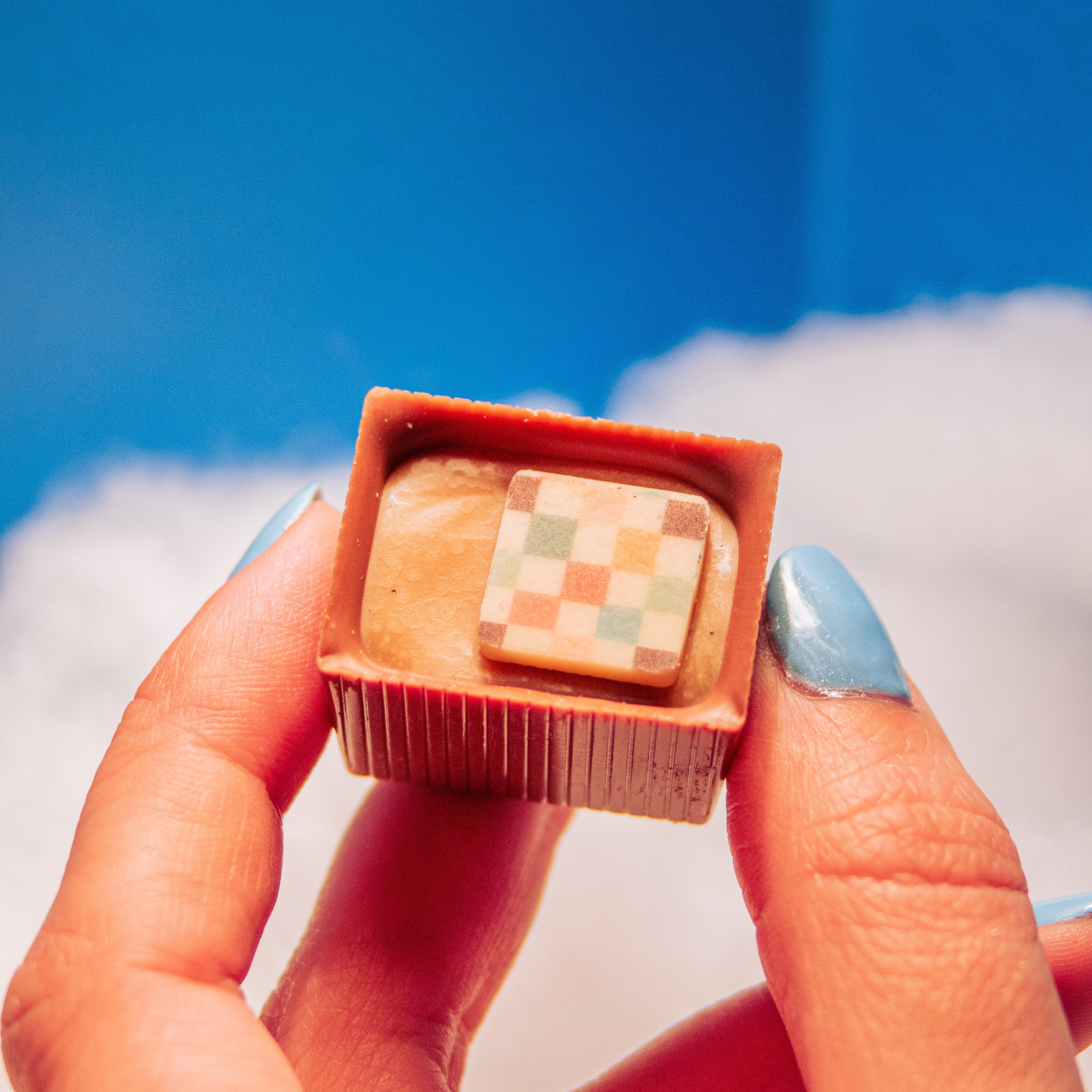 Hand holding Bon in the sky