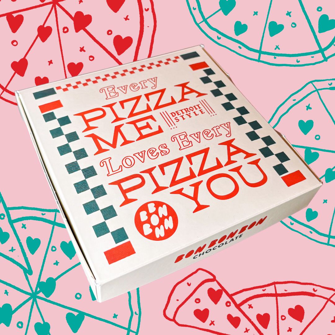Bon Bon Bon Pizza Box packaging on pink background with red and teal drawings of pizza 