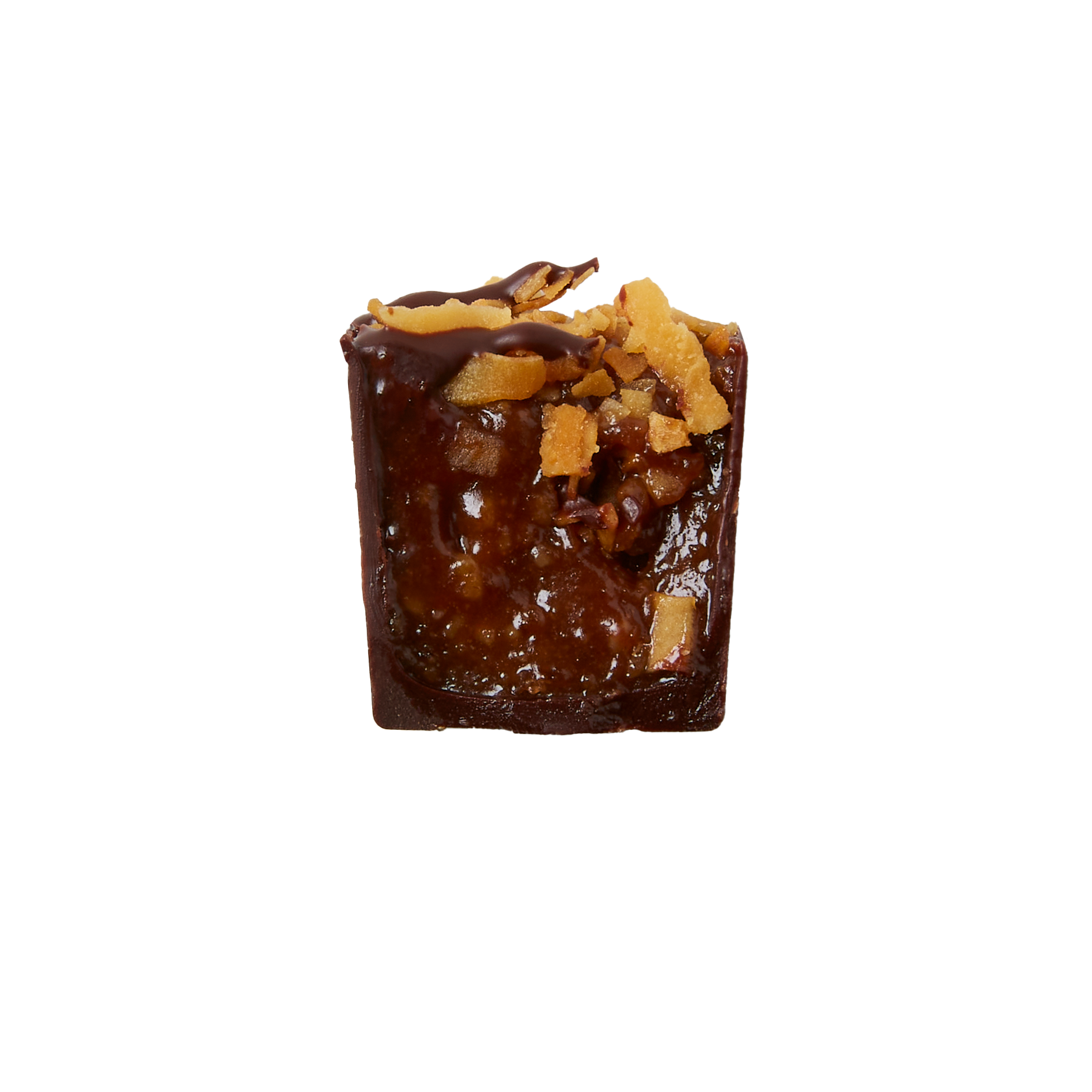 The Rustler Ranger cookie caramel ganache with coconut and oats bon bon cut in half