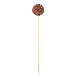 A chocolate lollipop with a round nib cluster on a stick, against a white background.