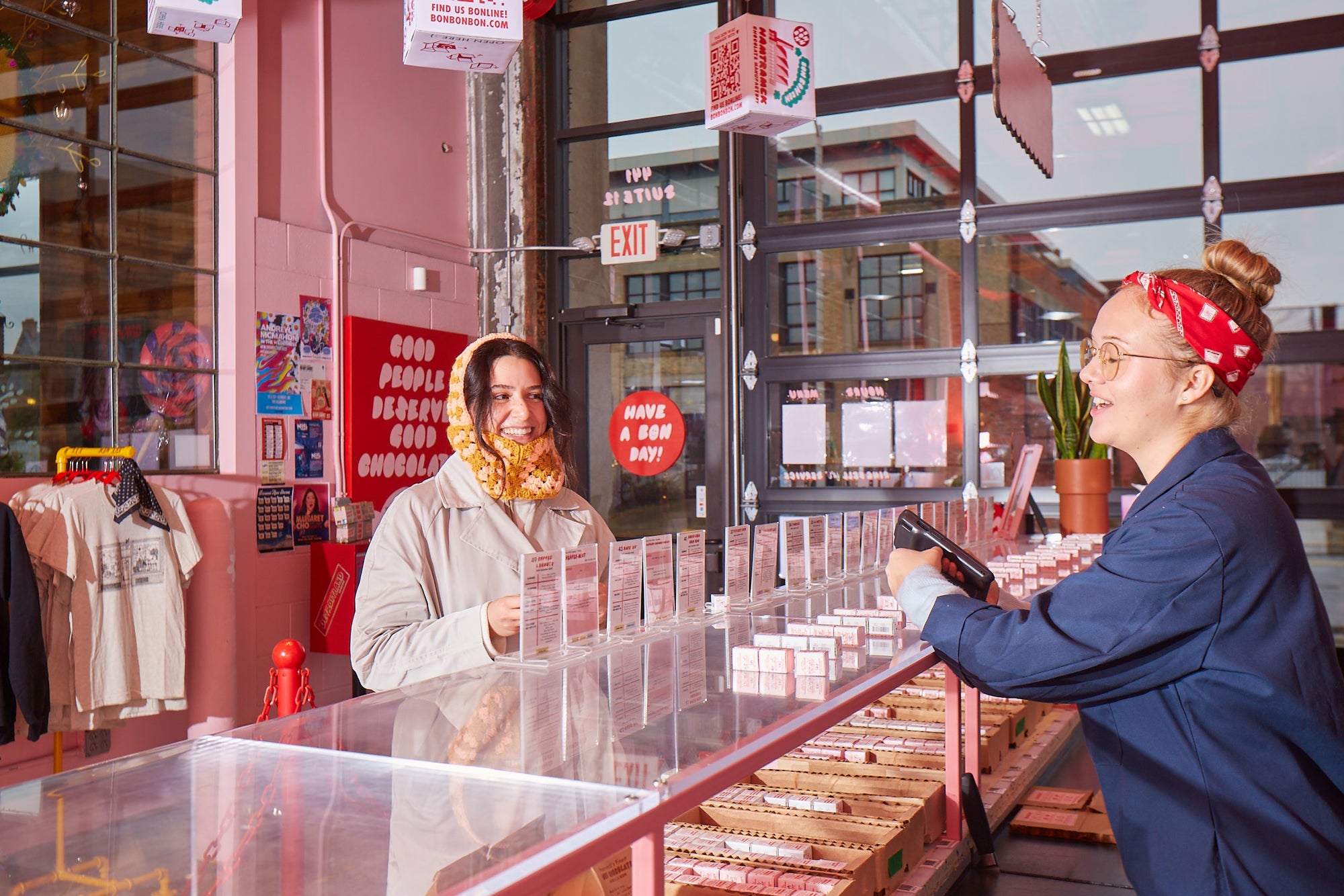 Customer smiling while buying bon bons at the Bon Bon Bon Ann Arbor store